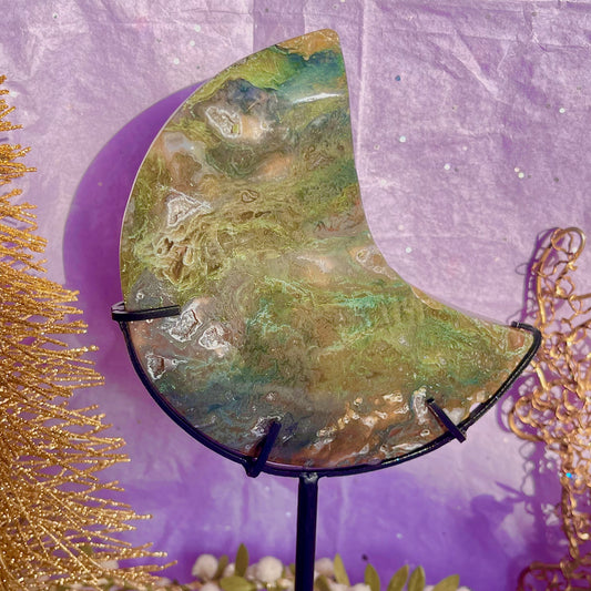 moss agate moon carving on stand